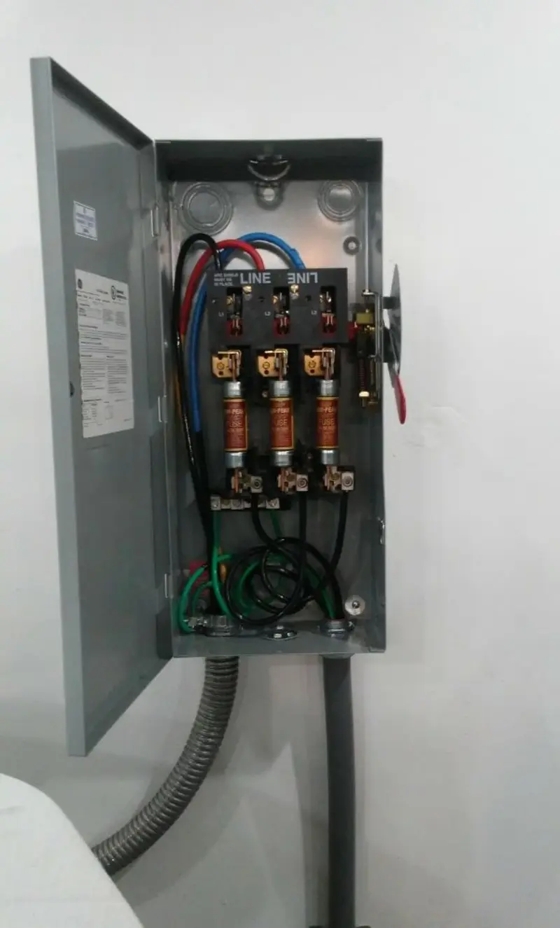 Three-phase disconnect switch installed for Smoke Detector Installation in Waukon